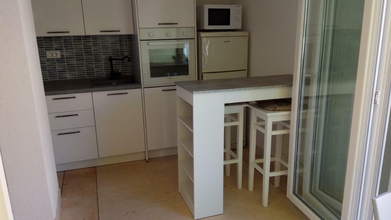 Apartments Marcic Bol Esterno foto